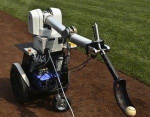 The one-armed, three-wheeled robot will throw out the ceremonial first pitch before the Wednesday, April 20, 2011, game between the Philadelphia Phillies and Milwaukee Brewers as part of Science Day festivities (image courtesy The Associated Press).