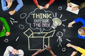 Group of People with Think Outside the Box Concept