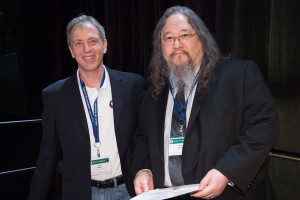 CCC Chair Greg Hager presenting David Ackley with his Blue Sky Ideas Award at AAAI 2016.